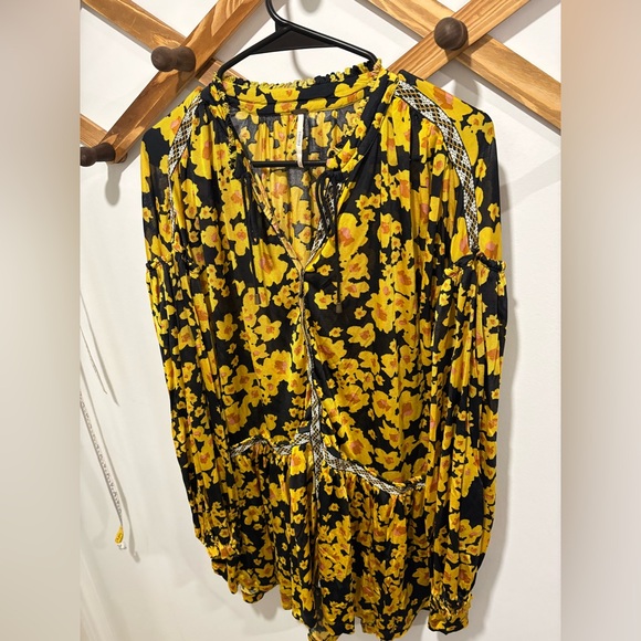 Free People Love Letter Floral Tunic Blouse in a black and yellow floral print. - Picture 6 of 11